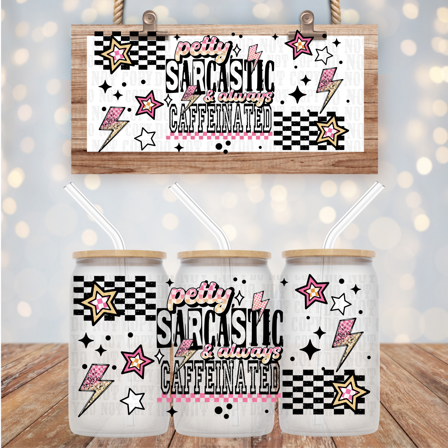 Three white tumblers with 'petty sarcastic always caffeinated' text and star, lightning bolt, and checkered designs on a wooden surface.